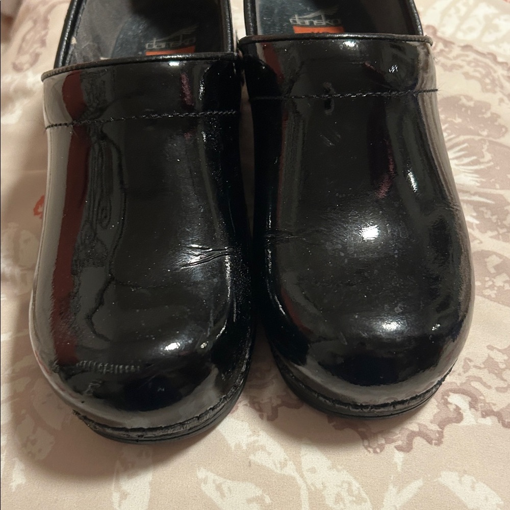 Dansko Black Patent Leather Clogs